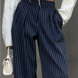 Pantaloni de birou cu pliuri și picior larg cu dungi